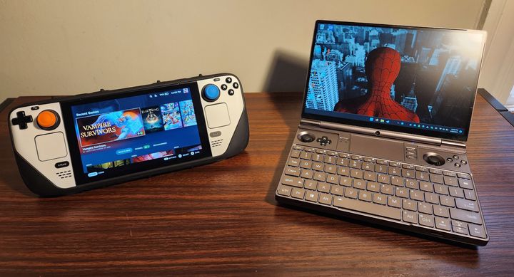The Steam Deck on the left in comparision to the GPD Win Max 2, a mini gaming laptop handheld on the right.